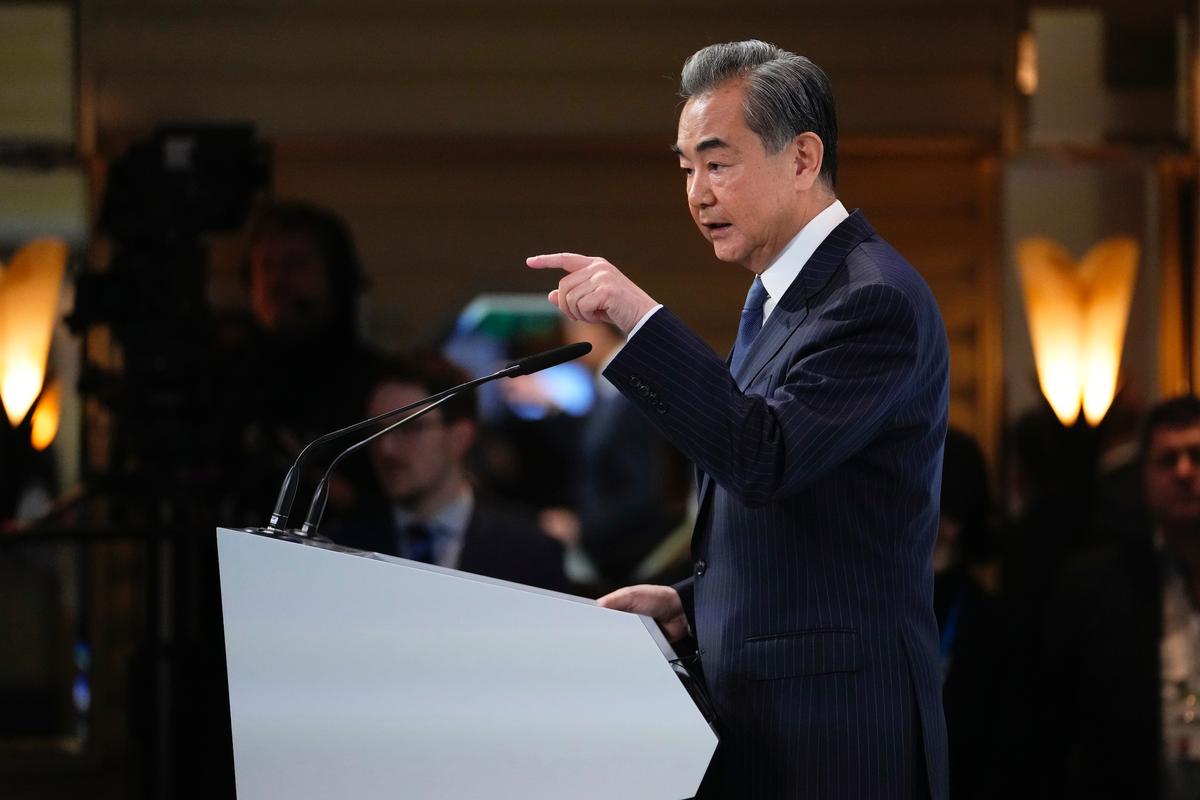 China's Director of the Office of the Central Foreign Affairs Commission Wang Yi speaks at the Munich Security Conference in Munich, on Feb. 18, 2023. (AP Photo/Petr David Josek)