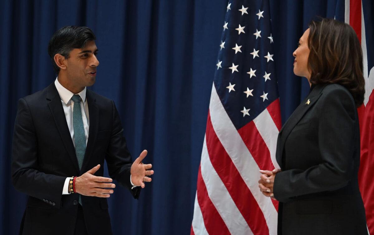 Britain's Prime Minister Rishi Sunak (L) speaks with U.S. Vice President Kamala Harris as they meet at the Munich Security Conference in Munich, on Feb. 18, 2023. ( Ben Stansall-WPA Pool/Getty Images)