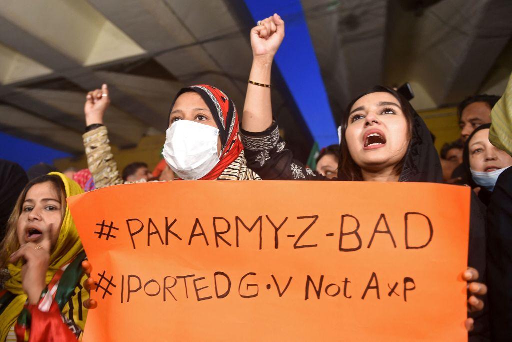 Supporters of Pakistan's former prime minister Imran Khan, shout slogans during a protest against an assassination attempt on Khan, on Nov. 6, 2022. (Rizwan Tabassum/AFP via Getty Images)