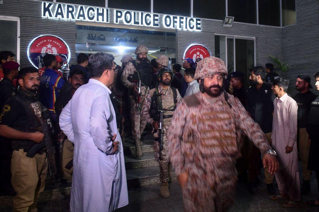 Paramilitary soldiers leave a police compound after taking control of a building following an attack by Pakistani Taliban fighters in Karachi on Feb. 17, 2023. (Asif Hassan/AFP via Getty Images)