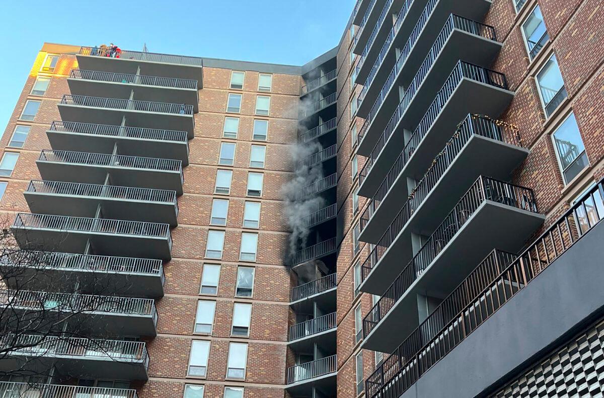 Smoke billows from a fire at a high-rise apartment building in Silver Springs, Md., on Feb. 18, 2023. (Montgomery County Fire & Rescue Service via AP)