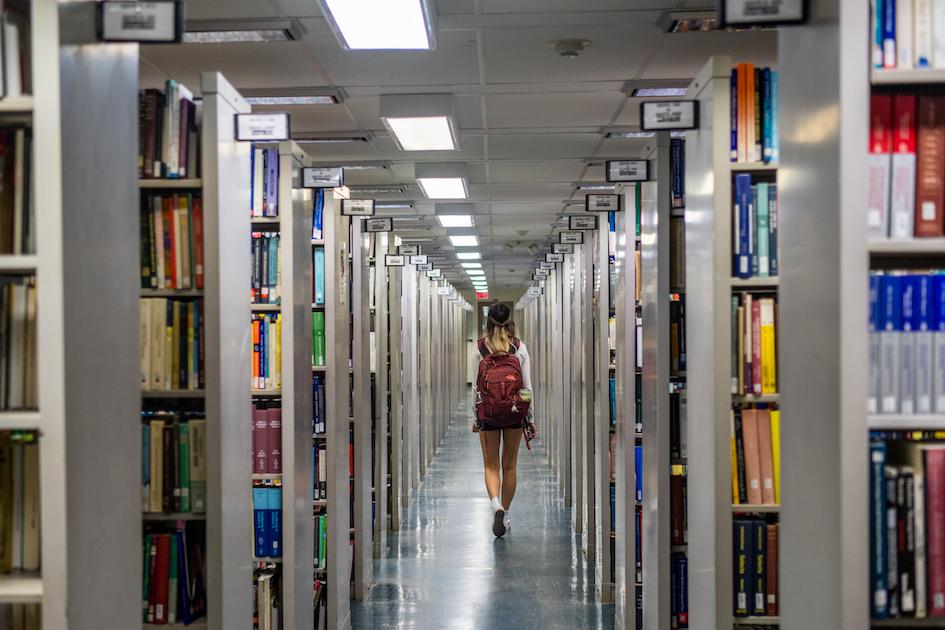 A person walks through the Rice University Library in Houston, Texas, on April 26, 2022. (Courtesy of Brandon Bell/Getty Images)