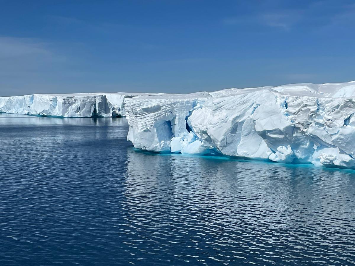 Vibrant white and blue tabular icebergs that float in the Prince Gustav Channel in Antarctica can be miles long but are quickly melting. (Photo courtesy of Lesley Frederikson)