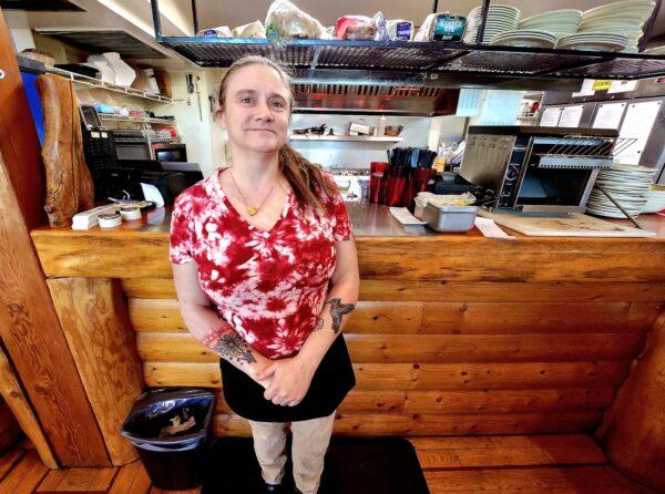 Jennifer Kernan, a server at the Old Mill Eatery and Smokehouse in Shasta Lake, Calif., on Feb. 14, 2023, said she was hopeful the rains will replenish much of Lake Shasta during the current drought. (Allan Stein/The Epoch Times)