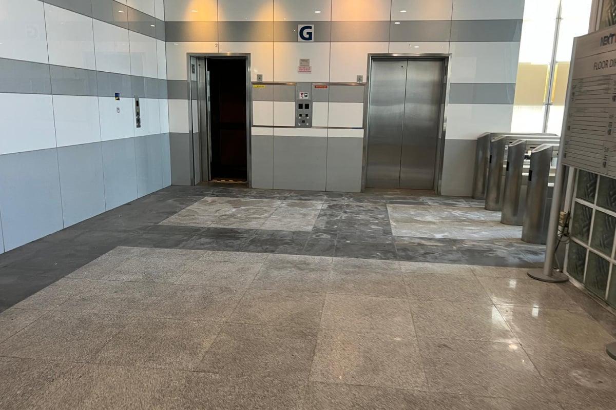 An out-of-order half-open elevator at the former Apple Daily office in Hong Kong on Feb. 15, 2023. (Courtesy of anonymous former employee/The Epoch Times)