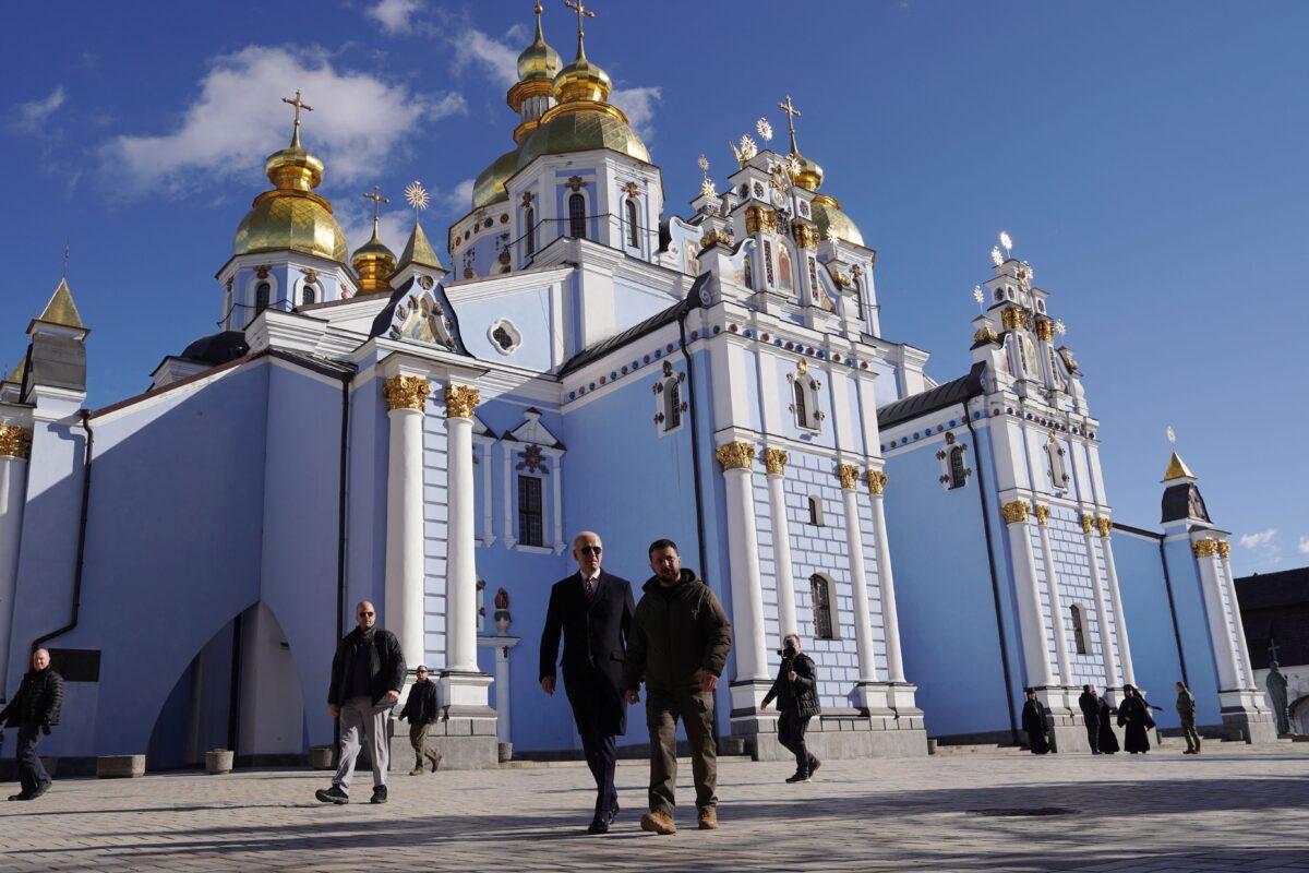 President Joe Biden (C-L) walks next to Ukrainian President Volodymyr Zelenskyy (C-R) in front of St. Michael's Golden-Domed Monastery as he arrives for a visit in Kyiv, Ukraine, on Feb. 20, 2023. (Dimitar Dilkoff/AFP/Getty Images)
