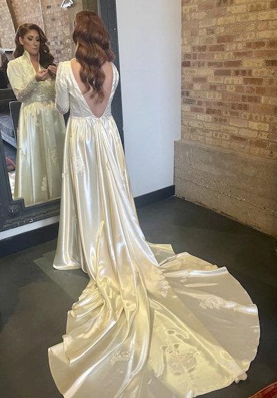Nicole Dworak wearing the wedding dress. (SWNS)