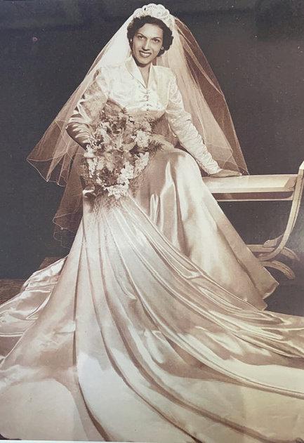 Nicole's grandmother Pauline wearing the wedding dress. (SWNS)