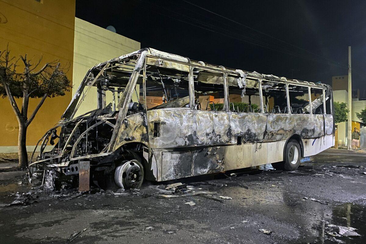 A bus was burned during an attack by an armed group operating in the area, in Celaya, Guanajuato state, Mexico, on Jan. 31, 2023. (Jesus Valencia/AFP/Getty Images)