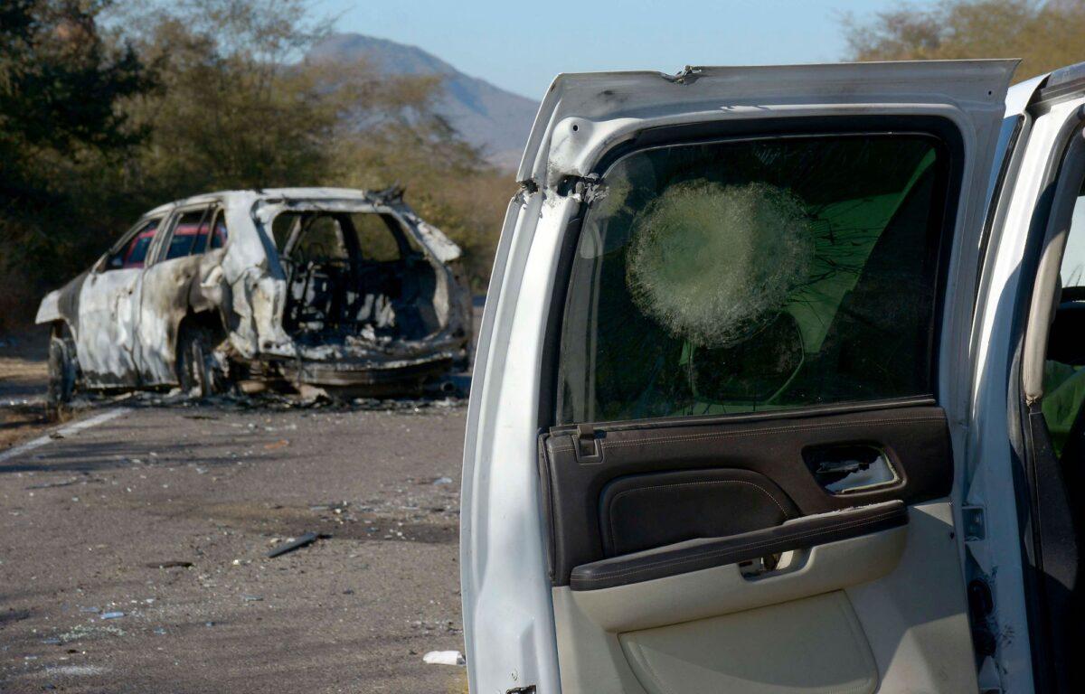 Cars burnt and destroyed during an operation to arrest Ovidio Guzman, son of jailed drug trafficker Joaquin "El Chapo" Guzman, in Culiacan, Sinaloa state, Mexico, on Jan. 7, 2023. (Juan Carlos Cruz/AFP/Getty Images)