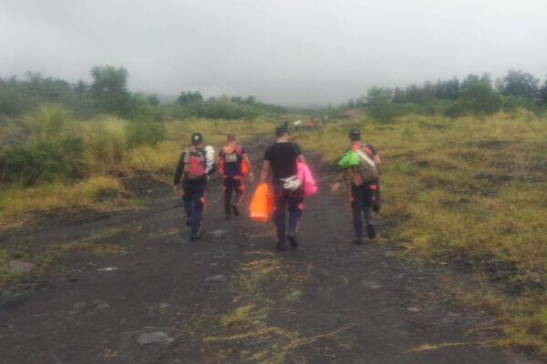 Rescuers continue their search for passengers of a Cessna 340 aircraft with registry number RP-C2080 at Tumpa Gulley, Camalig town, Albay province, the Philippines, on Feb. 20, 2023. (Bureau of Fire Protection Camalig via AP)