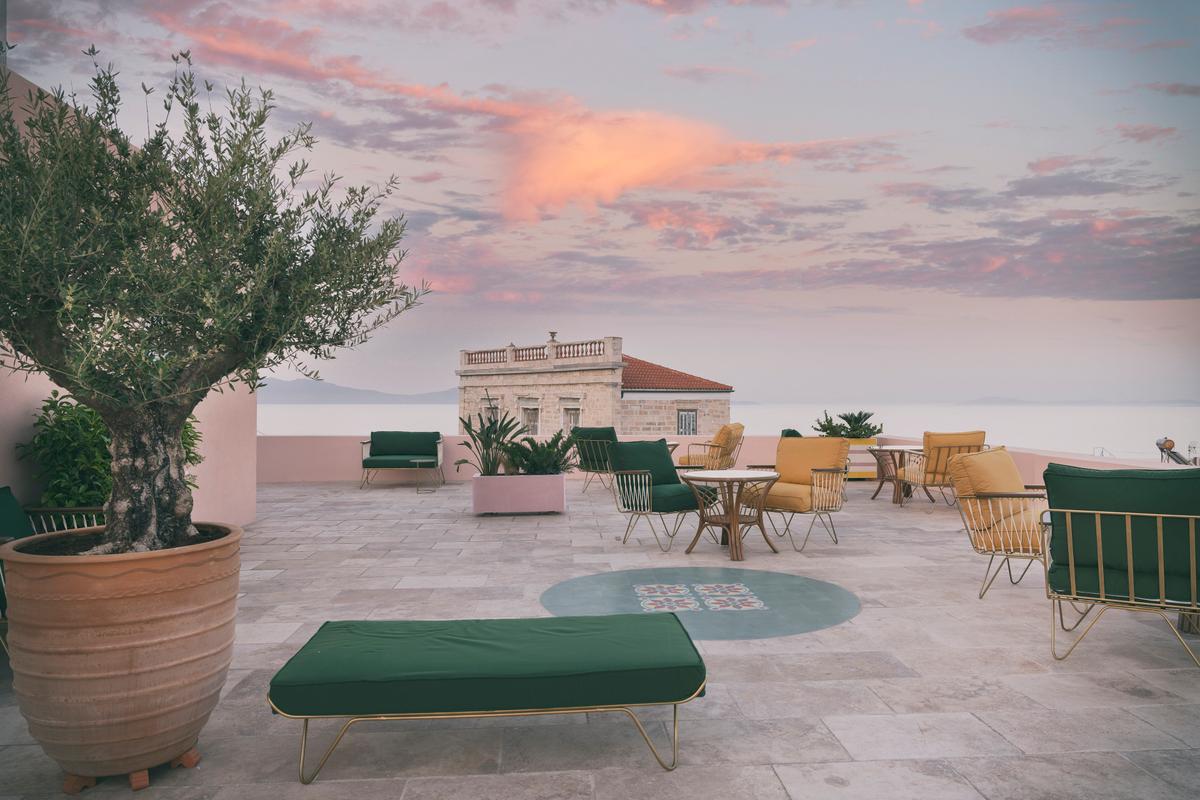 The rooftop terrace overlooks Spyros Island’s capital, its most prestigious neighborhood, and provides front row seating for stunning Aegean sunrises. (Courtesy of Greece Sotheby’s International Realty)