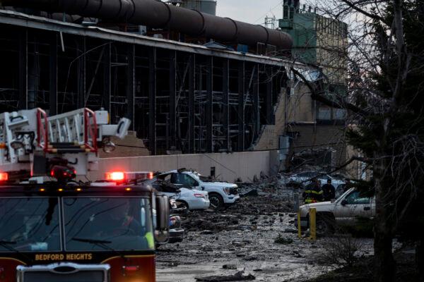Debris covers the ground and nearby cars after an explosion at the I. Schumann & Co. metals plant in Bedford, Ohio, on Feb. 20, 2023. (Michael Swensen/Getty Images)