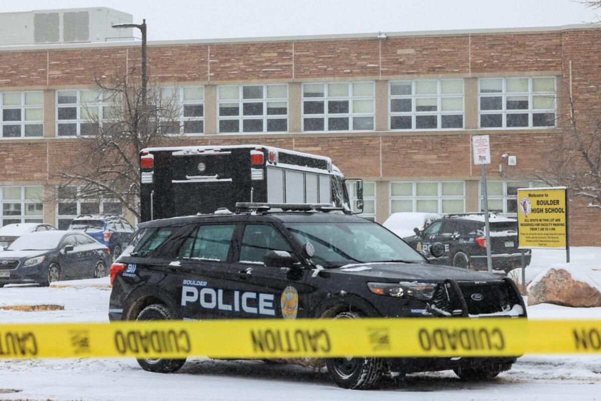 A police vehicle is seen in front of the Boulder High School after police responded to an unconfirmed report of an active shooter in Boulder, Colo., on Feb. 22, 2023. (Kevin Mohatt/Reuters)