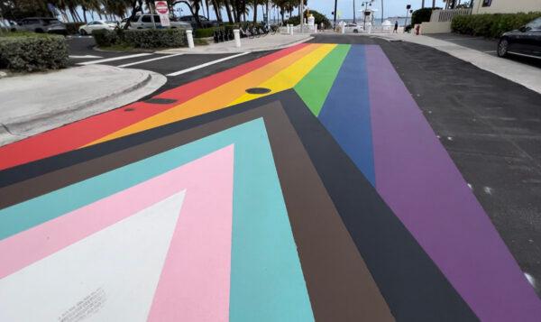 Ft. Lauderdale leaders unveiled a new "Progress Pride" flag painted on a public roadway near Ft. Lauderdale Beach on Feb. 10, 2023. (Chris Nelson for The Epoch Times)