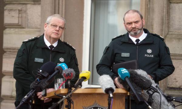PSNI Chief Constable Simon Byrne (L) and Assistant Chief Constable Mark McEwan speak to the media outside police headquarters in Belfast on Feb. 23, 2023. (PA Media)