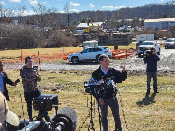 Transportation Secretary Pete Buttigieg holds a press conference on Feb. 23, 2022, near the site where a Norfolk Southern train derailed in East Palestine, Ohio. (Jeff Louderback/The Epoch Times)