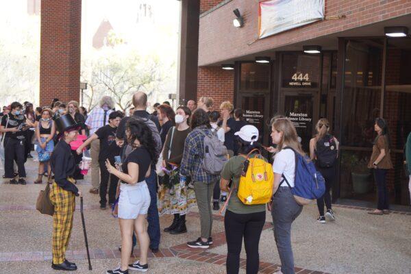 Students protest state lawmakers' effort to curb diversity, equity, and inclusion policies at a planned "walkout" on the University of Florida campus in Gainesville, Fla., on Feb. 23, 2023. (Nanette Holt/The Epoch Times)