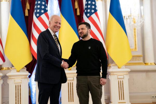 President Joe Biden (L) shakes hands with Ukrainian President Volodymyr Zelenskyy at Mariinsky Palace during a visit in Kyiv, Ukraine, on Feb. 20, 2023. (Evan Vucci, Pool/AP Photo)