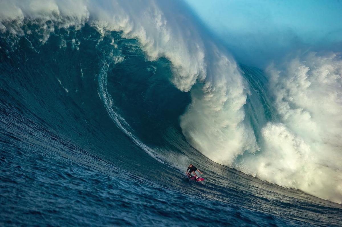 A surfer rockets down a huge collapsing wave. (Courtesy of <a href="https://www.instagram.com/fred_pompermayer/">Fred Pompermayer</a>)