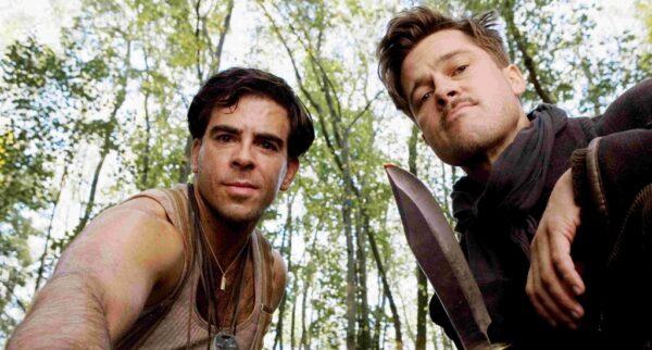 Sergeant Donny Donowitz (Eli Roth, L) and Lieutenant Aldo Raine (Brad Pitt) work together against Nazis, in "Inglorious Basterds." (Universal Pictures)