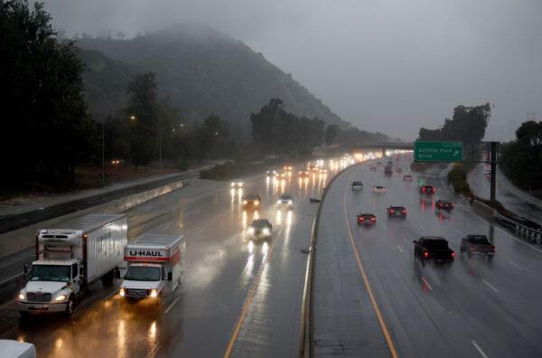 Vehicles drive through winter storm rains on Interstate 5 in Los Angeles, on Feb. 24, 2023. (Mario Tama/Getty Images)