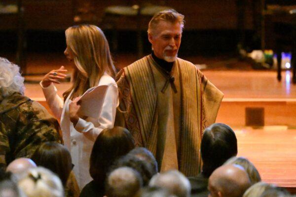 Husband John Easterling (right) during a state memorial service for Olivia Newton-John at Hamer Hall in Melbourne, Sunday, February 26, 2023. (AAP Image/James Ross)