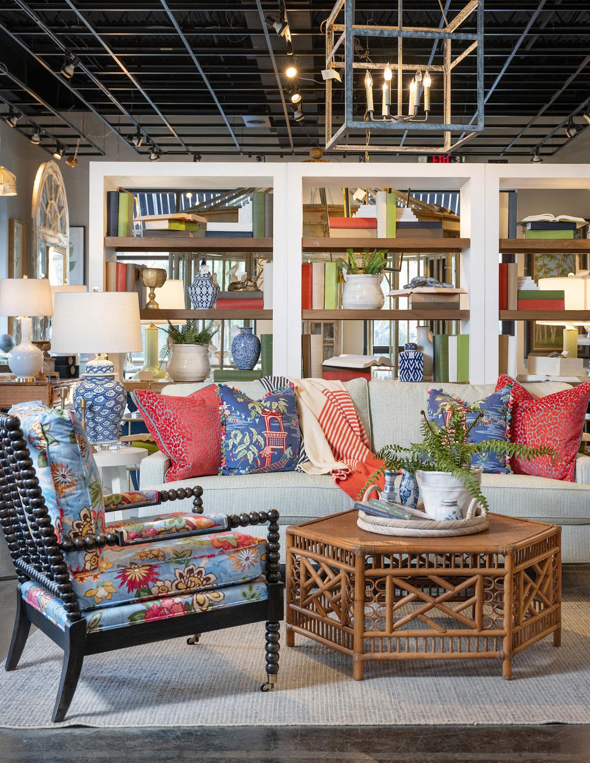 This living room is bursting with color, from the red and blue textiles to the multi-toned wood. (Handout/TNS)