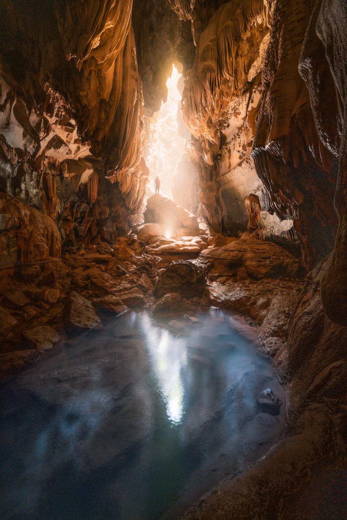 An explorer inside Thung Cave. (Courtesy of Cao Ky Nhan via Jungle Boss Tours)