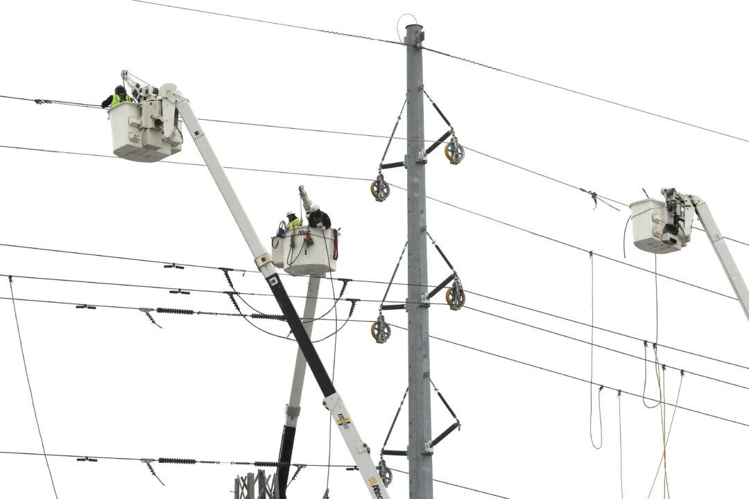 Michigan Power Crews Work, California Recovers After Storms