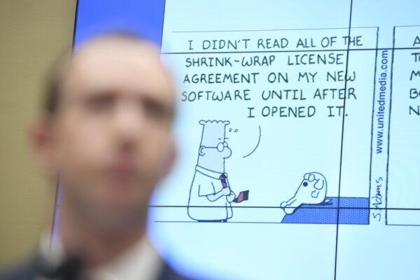 A Dilbert comic seen during a U.S. House Committee on Energy and Commerce hearing about Facebook on Capitol Hill in Washington, on April 11, 2018. (Saul Loeb/AFP via Getty Images)