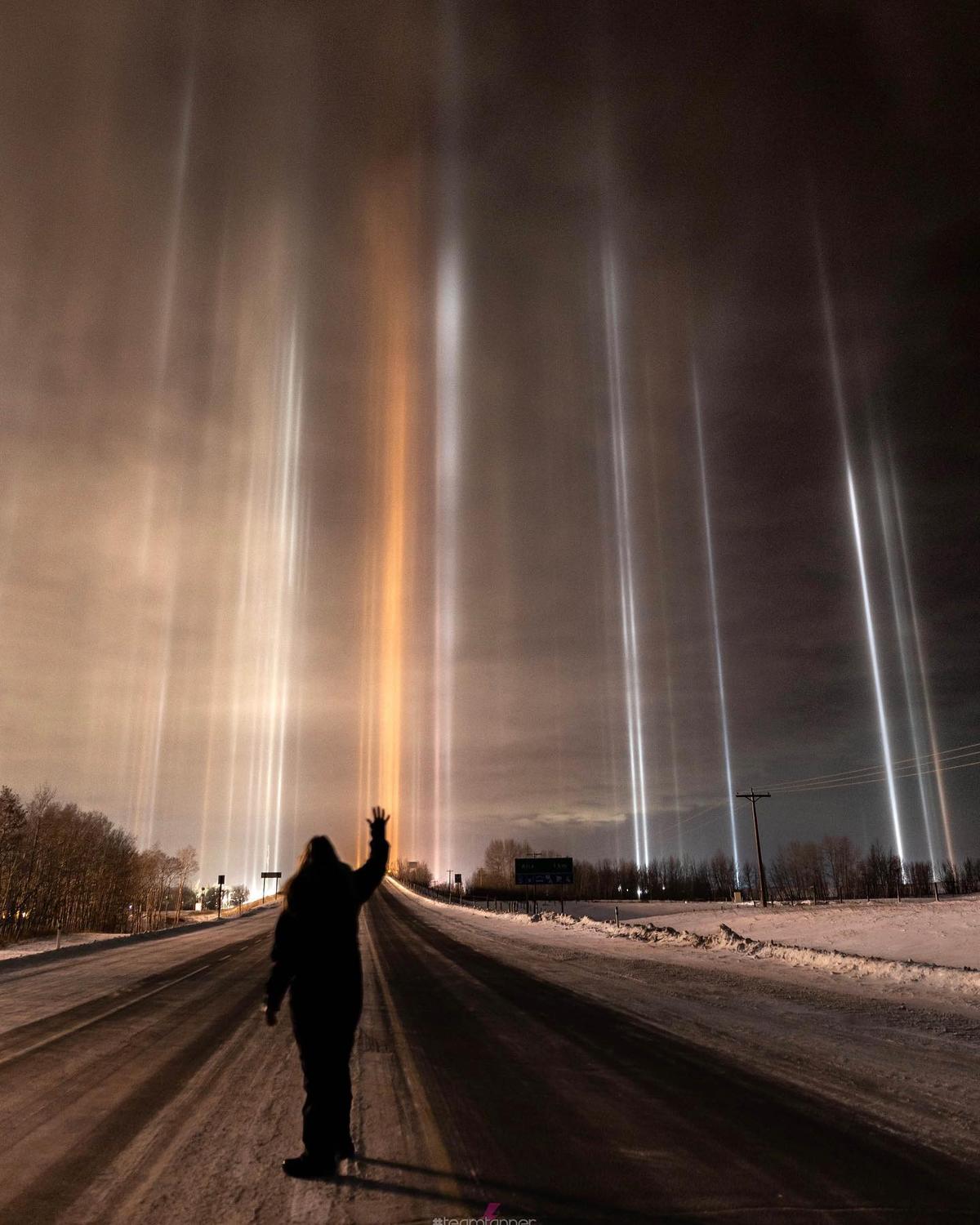A photograph shows light pillars in central Alberta, Canada, in December 2022. (Courtesy of <a href="https://www.instagram.com/dartanner/">Dar Tanner</a>)