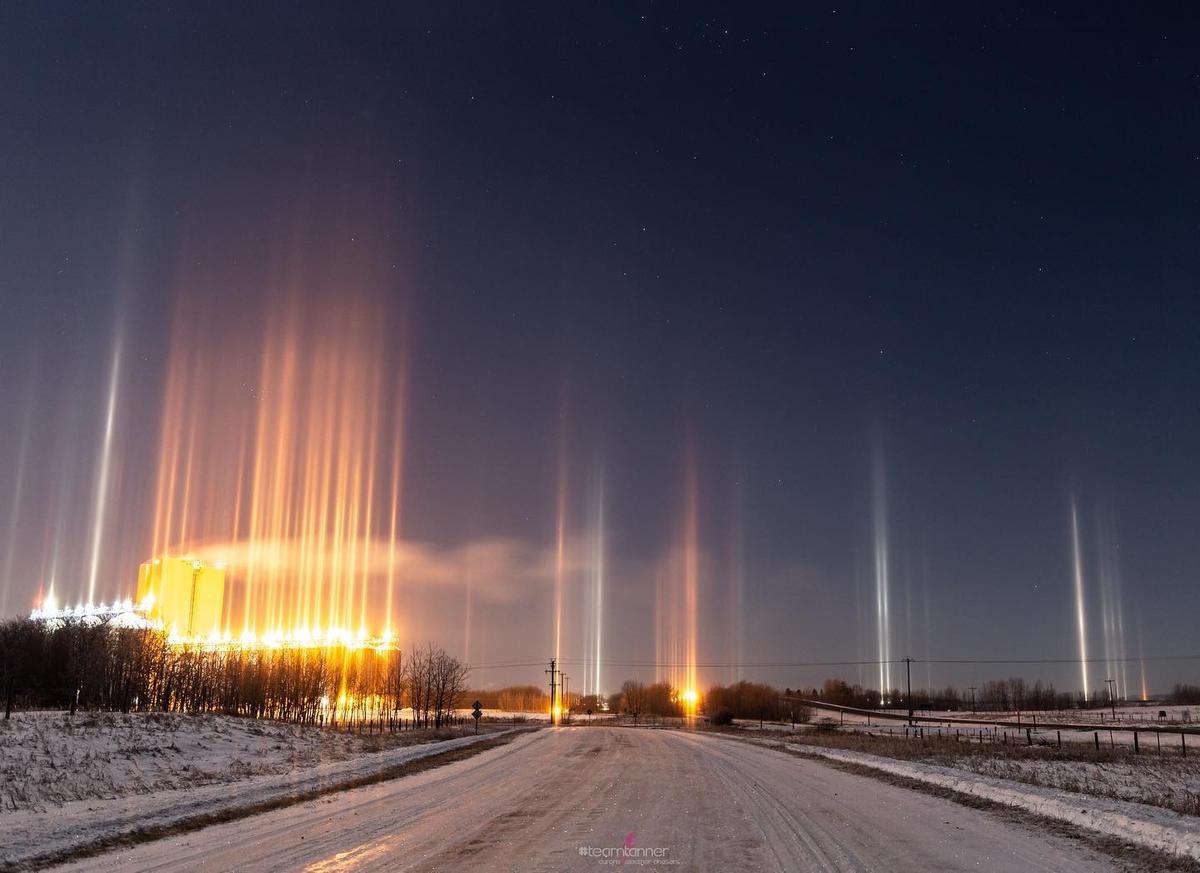 Light pillars appear due to ice crystals, extreme cold, and artificial light in central Alberta, Canada. (Courtesy of <a href="https://www.instagram.com/dartanner/">Dar Tanner</a>)