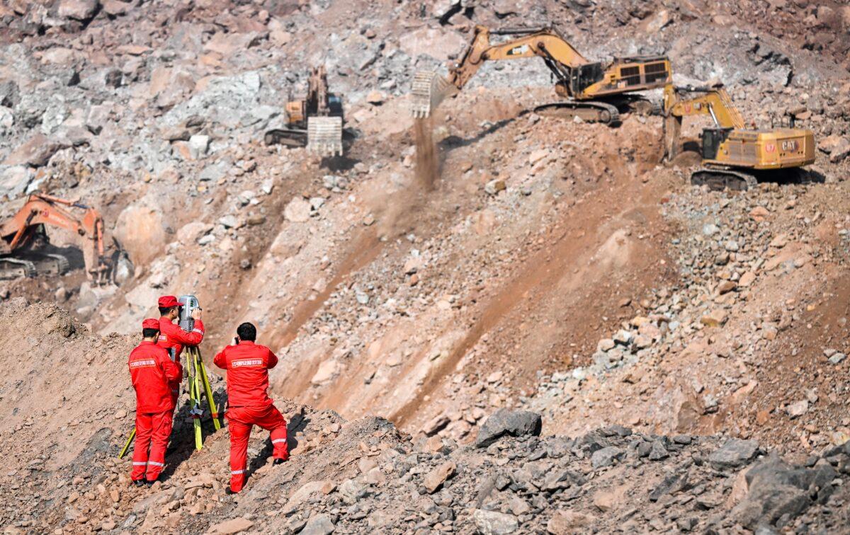 Rescuers work at the site of a collapsed open pit coal mine in Alxa Banner in northern China's Inner Mongolia Autonomous Region, on Feb. 24, 2023. (Lian Zhen/Xinhua via AP)