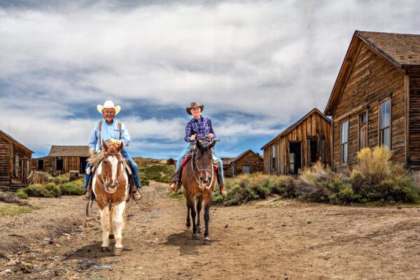 Bodie Foundation President Benny Romero and article’s author riding into town. (Maria Coulson)