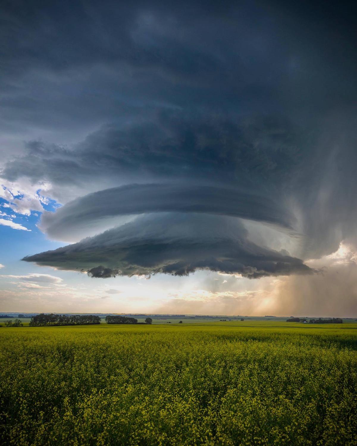 A tornado and storm clouds over central Alberta, Canada. (Courtesy of <a href="https://www.instagram.com/dartanner/">Dar Tanner</a>)