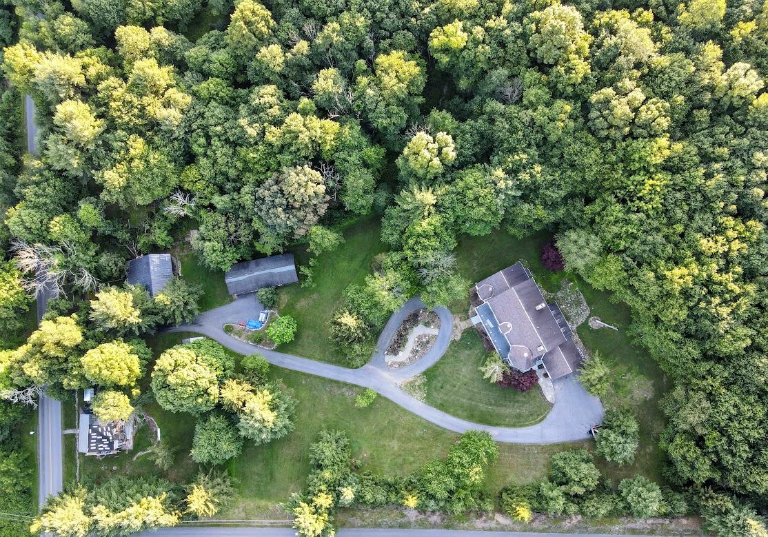An aerial view of the 31-acre property. (Courtesy of <a href="https://www.instagram.com/crazyfixerupper/">DeWitt Paul</a>)