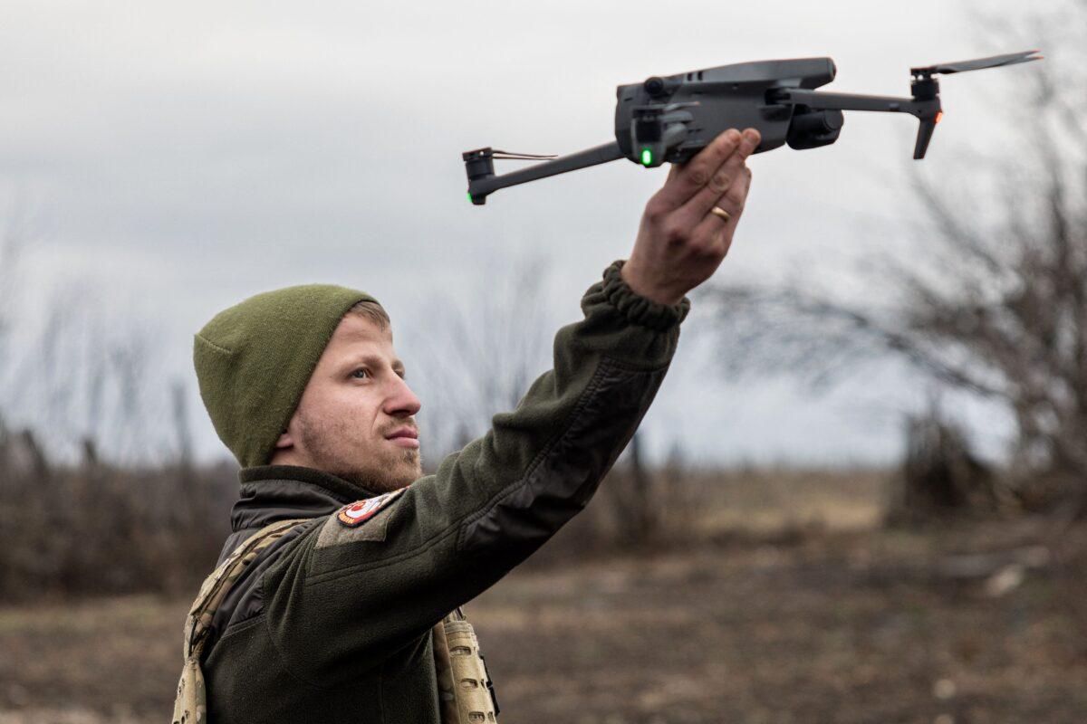 A Ukrainian serviceman flies a drone on the outskirts of Bakhmut, in eastern Ukraine, on Dec. 30, 2022. (Sameer Al-Doumy/AFP via Getty Images)