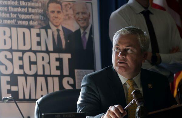 With a poster of a New York Post front-page story about Hunter Biden's emails on display, Committee Chairman Rep. James Comer (R-Ky.) announces a recess because of a power outage during a hearing before the House Oversight and Accountability Committee at Rayburn House Office Building on Capitol Hill in Washington on Feb. 8, 2023. (Alex Wong/Getty Images)