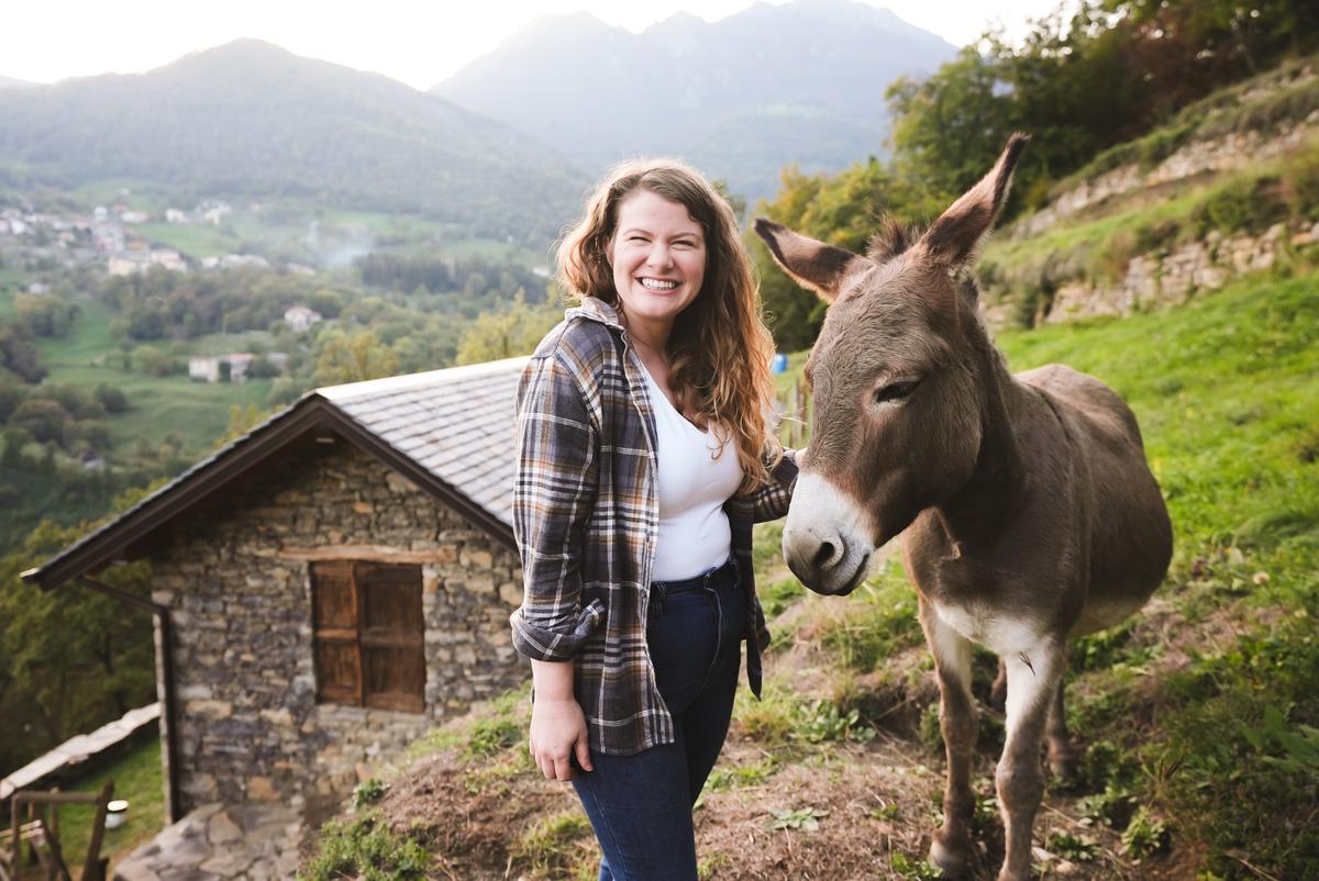 Heather Jobson with the donkey, Stella. (Courtesy of <a href="https://www.youtube.com/c/RaisingVoyagers">Raising Voyagers</a>)