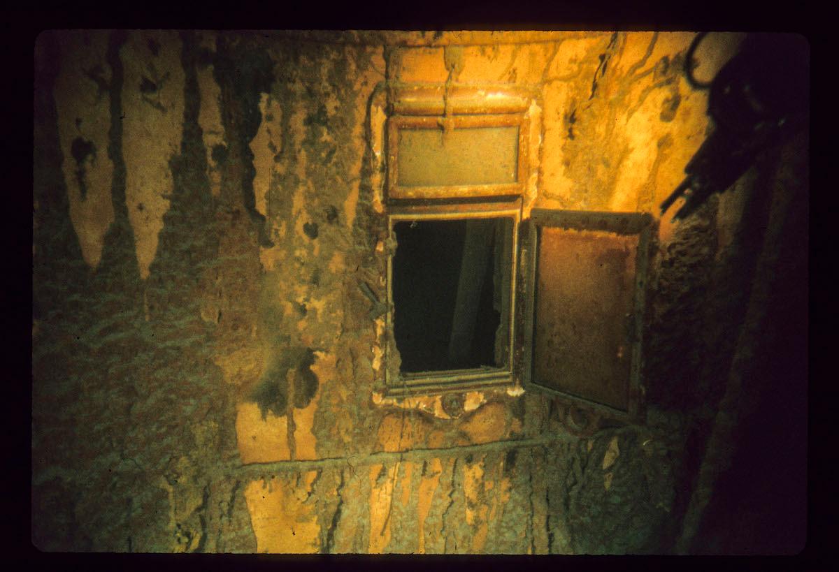 A porthole of the Titanic. (Courtesy of WHOI Archives /©Woods Hole Oceanographic Institution)