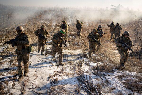 Ukrainian servicemen of the 3rd Separate Tank Iron Brigade take part in a drill, not far from the frontlines, in the Kharkiv area, Ukraine, on Feb. 23, 2023. (Vadim Ghirda/AP Photo)