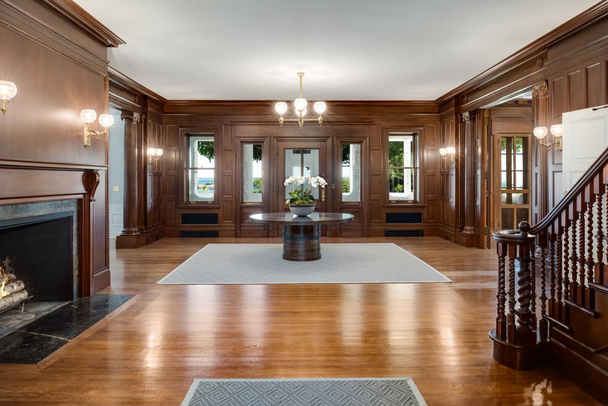Throughout the home, rich wood paneling, gleaming hardwood floors, and magnifiicent millwork provide an atmosphere of old world elegance. (Daniel Milstein for Sotheby’s International Realty)