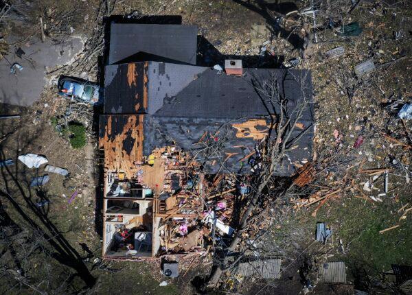 A house is destroyed from a tornado in Covington, Tenn., on April 1, 2023. (Patrick Lantrip/Daily Memphian via AP)