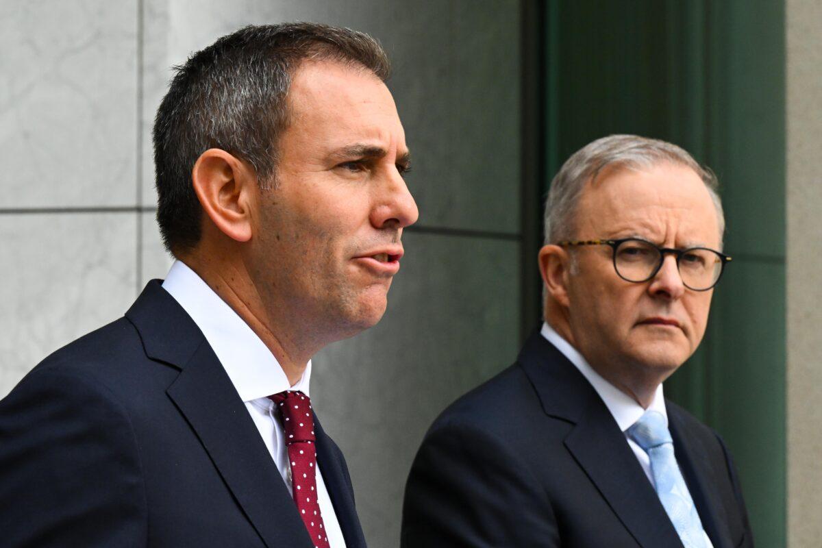 Australian Treasurer Jim Chalmers (L) speaks to the media during a press conference as Prime Minister Anthony Albanese looks on at Parliament House in Canberra, Australia, on Feb. 28, 2023. (AAP Image/Lukas Coch)