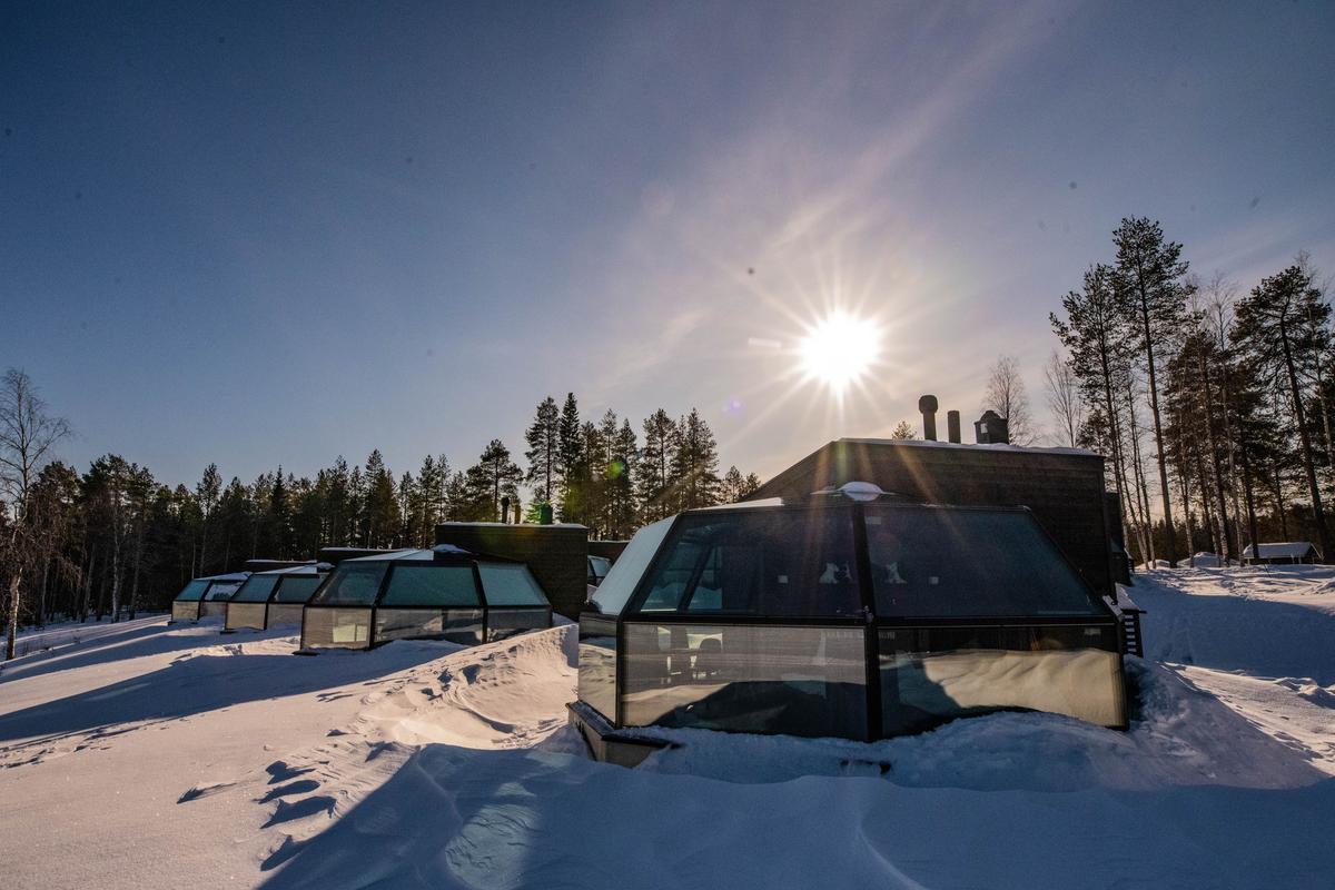 The exterior of several Arctic "glass igloos" in winter. (Courtesy of Ranua Resort)