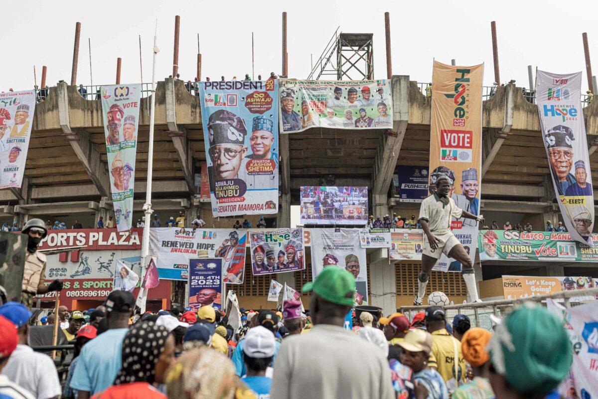 People enter Teslim Balogun Stadium during a rally for the All Progressives Congress (APC) presidential candidate Bola Ahmed Tinubu in Lagos on Feb. 21, 2023 ahead of the Nigerian presidential election scheduled for Feb. 25, 2023. (Patrick Meinhardt/AFP via Getty Images)