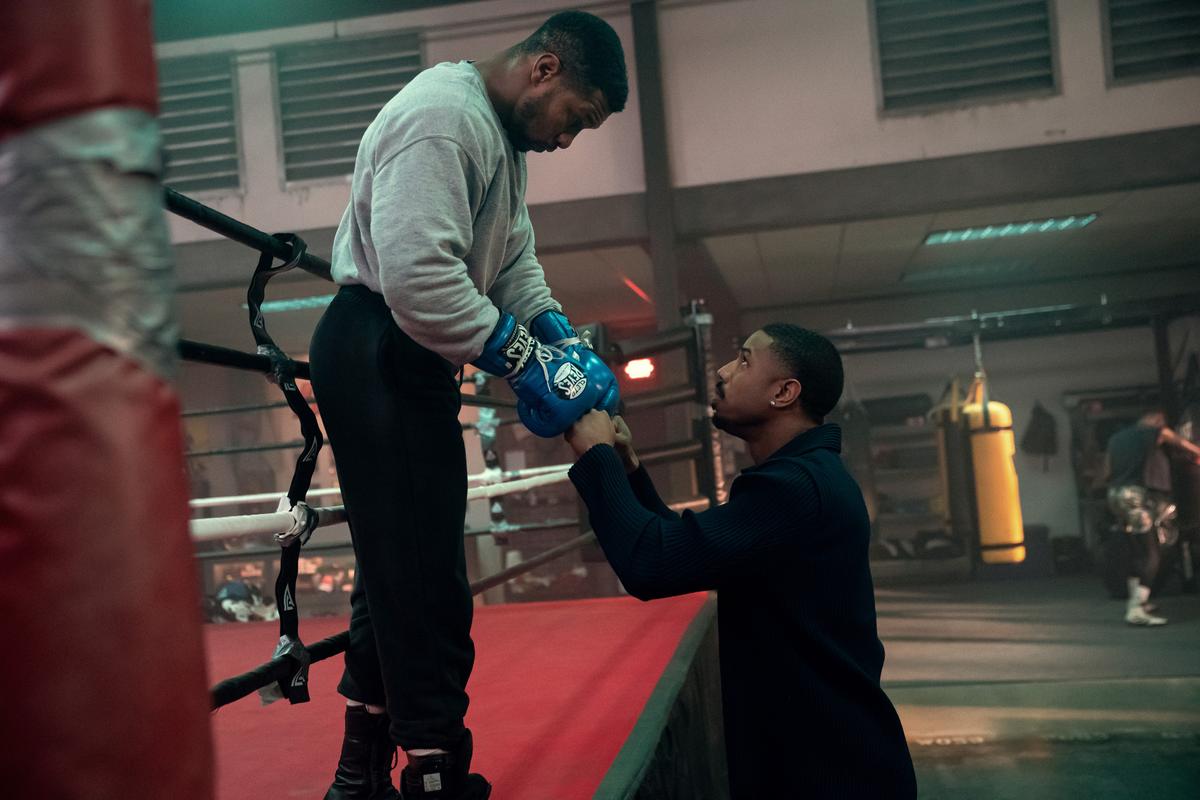 "Dame" Damian (Jonathan Majors, L), just released from prison, demands a shot at the world heavyweight championship from childhood friend Adonis Creed (Michael B. Jordan), in "Creed III." (MGM)
