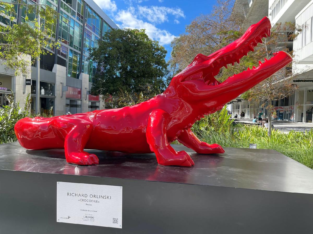 Richard Orlinski’st red crocodile enlivens the Lincoln Road Mall promenade in northern South Beach Miami, Florida. (Photo courtesy of Candyce H. Stapen)