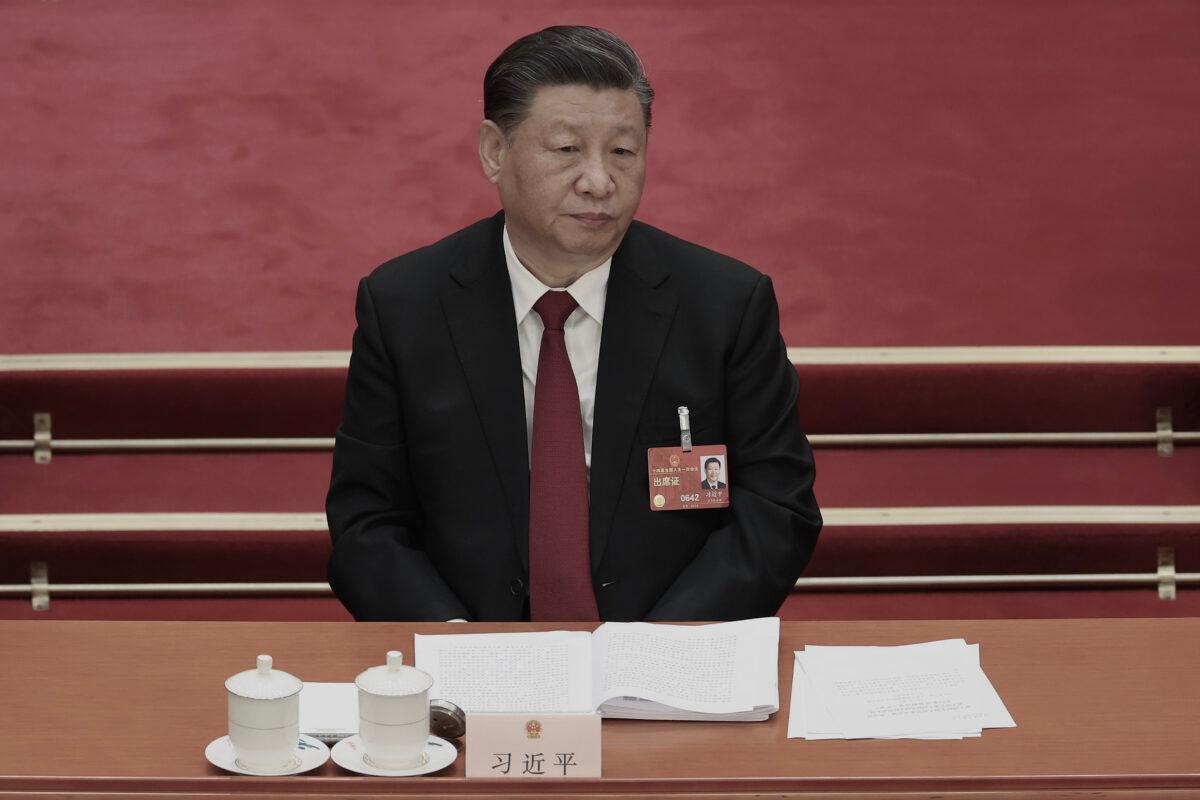 Chinese leader Xi Jinping attends the opening of the first session of the 14th National People's Congress in Beijing on March 5, 2023. (Lintao Zhang/Getty Images)